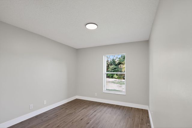 3037 Casa Rio Court, Riviera Beach, FL 33418