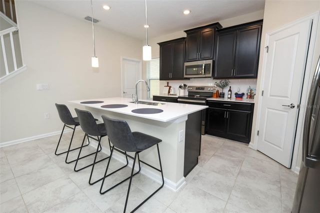 1076 DOWNSWING PLACE, Davenport, FL 33896