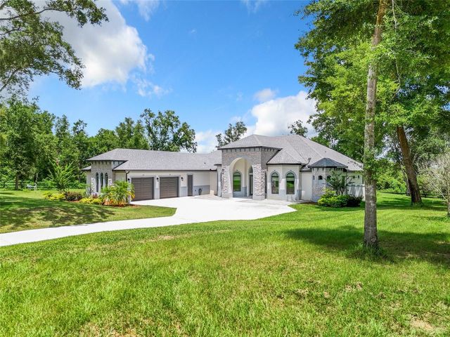 20404 WOLF SPRINGS COURT, Clermont, FL 34715