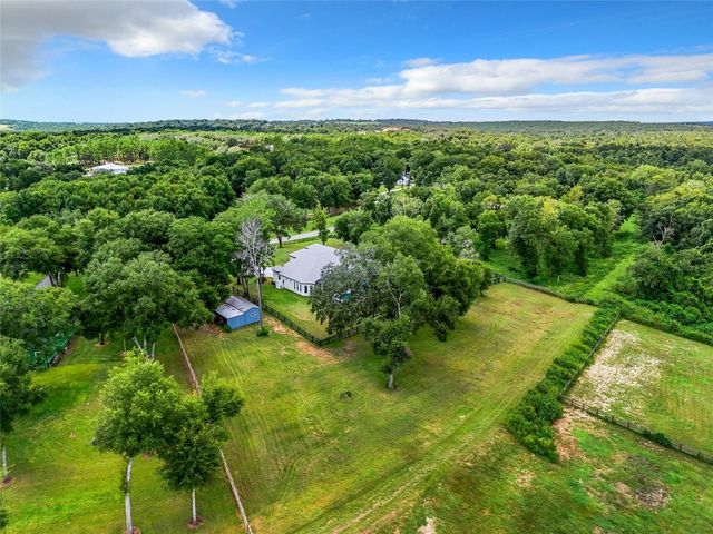 20404 WOLF SPRINGS COURT, Clermont, FL 34715