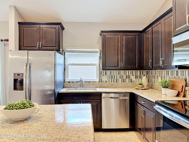 1523 Musgrass Circle, West Melbourne, FL 32904