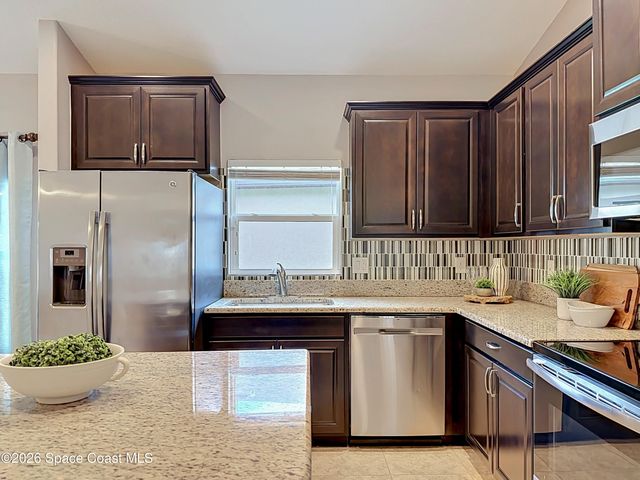 1523 Musgrass Circle, West Melbourne, FL 32904