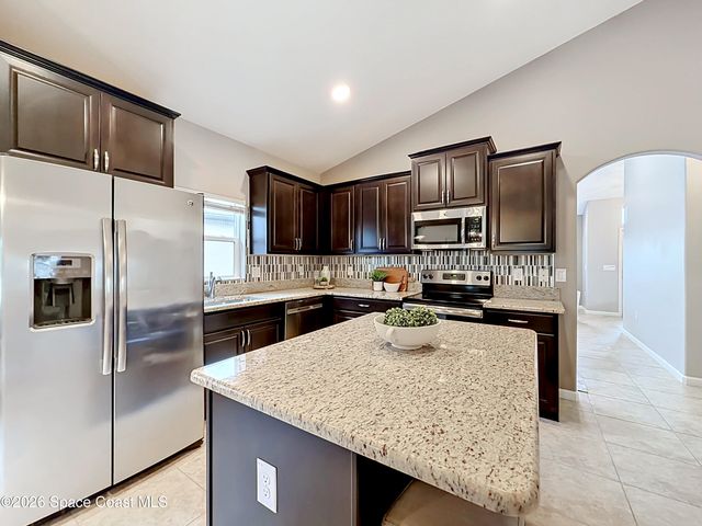 1523 Musgrass Circle, West Melbourne, FL 32904