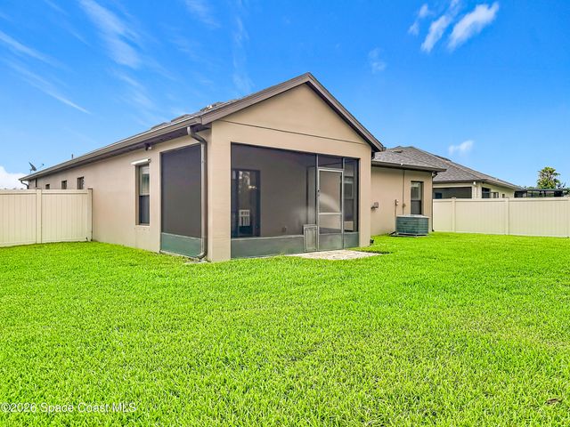 1523 Musgrass Circle, West Melbourne, FL 32904