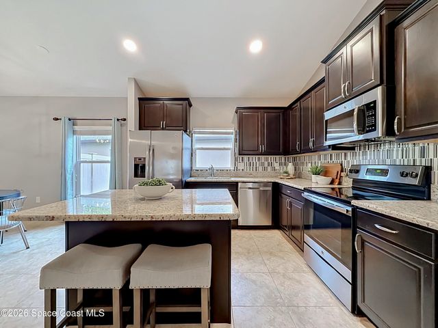 1523 Musgrass Circle, West Melbourne, FL 32904