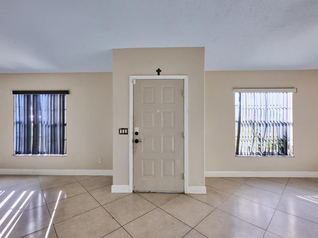 1407 SE Grapeland Avenue, Port St Lucie, FL 34952