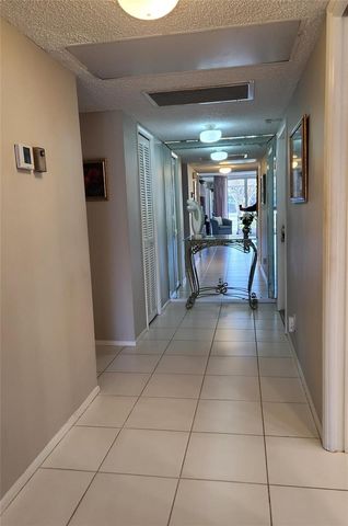 4030 W Palm Aire Drive 101, Pompano Beach, FL 33069
