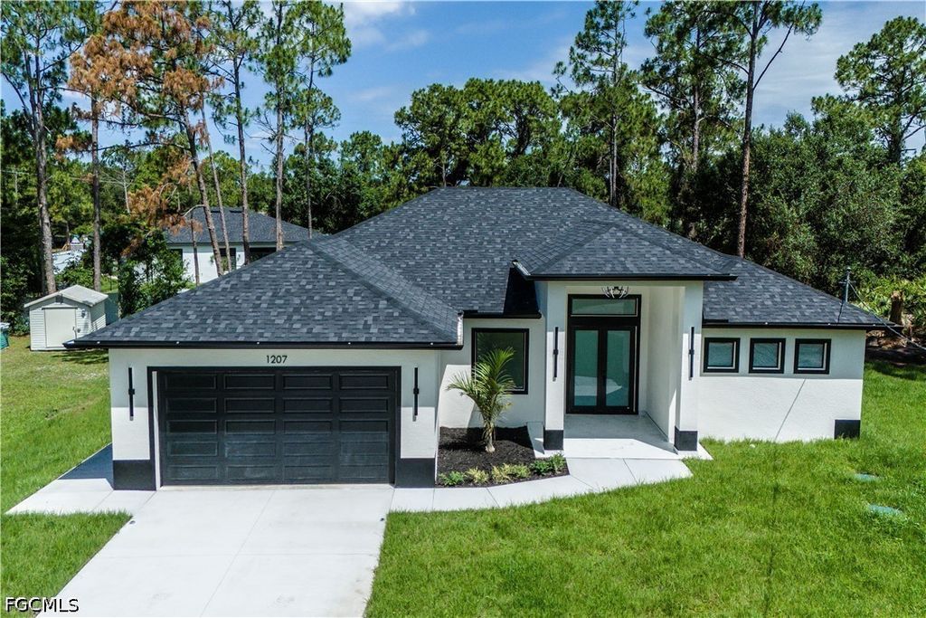 1207 Ramus ST E, Lehigh Acres, FL 33974
