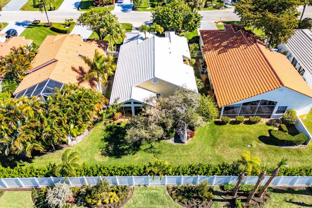 13853 Palm Grove Place, Palm Beach Gardens, FL 33418