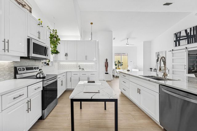 13853 Palm Grove Place, Palm Beach Gardens, FL 33418