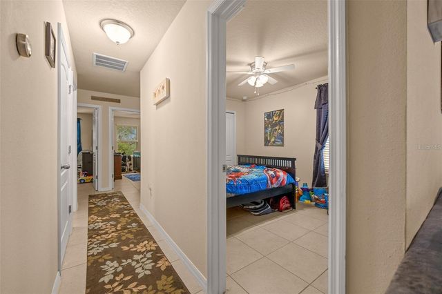 5128 GRASSY KNOLL DRIVE, Tavares, FL 32778