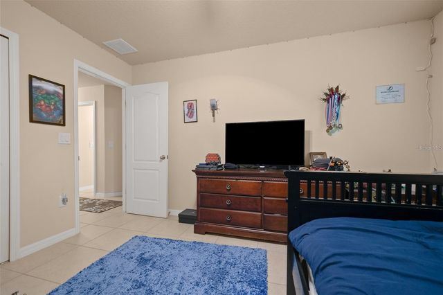 5128 GRASSY KNOLL DRIVE, Tavares, FL 32778