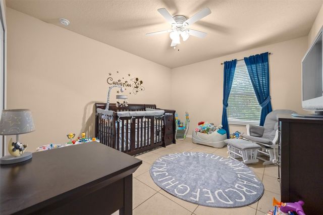 5128 GRASSY KNOLL DRIVE, Tavares, FL 32778