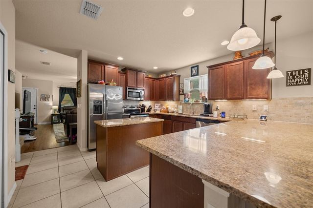 5128 GRASSY KNOLL DRIVE, Tavares, FL 32778