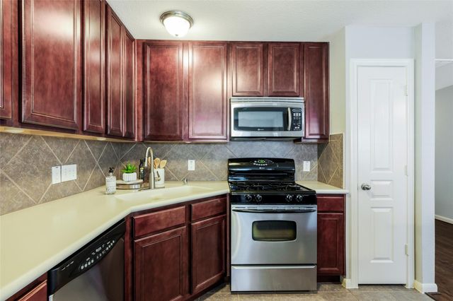 1648 Grable Cove Lane, Spring, TX 77379