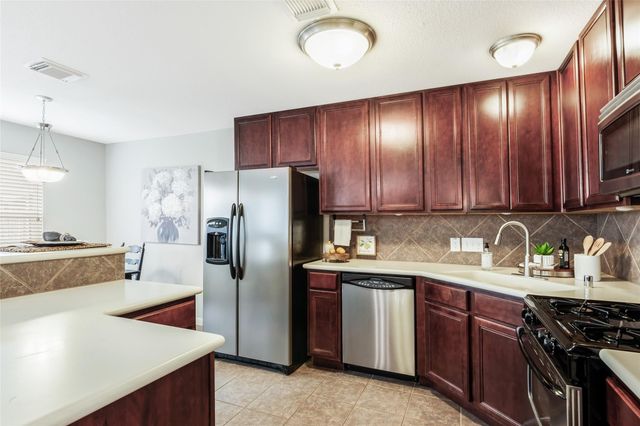 1648 Grable Cove Lane, Spring, TX 77379