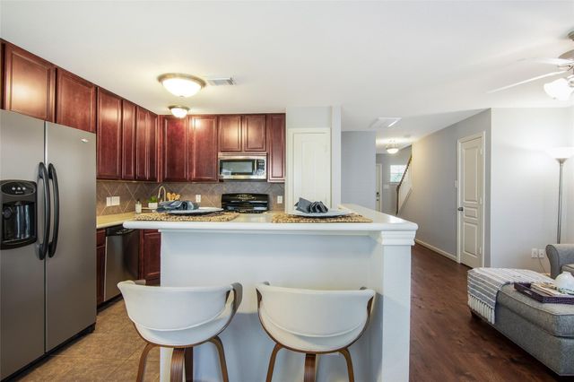 1648 Grable Cove Lane, Spring, TX 77379