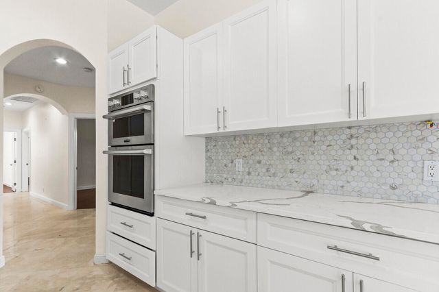 8280 Woodsmuir Drive, Palm Beach Gardens, FL 33412