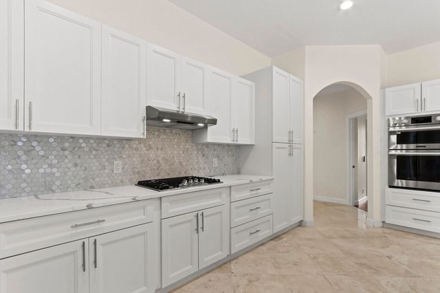 8280 Woodsmuir Drive, Palm Beach Gardens, FL 33412