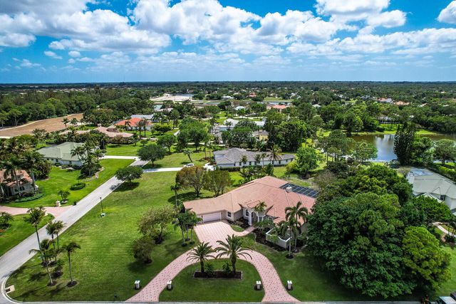 8280 Woodsmuir Drive, Palm Beach Gardens, FL 33412