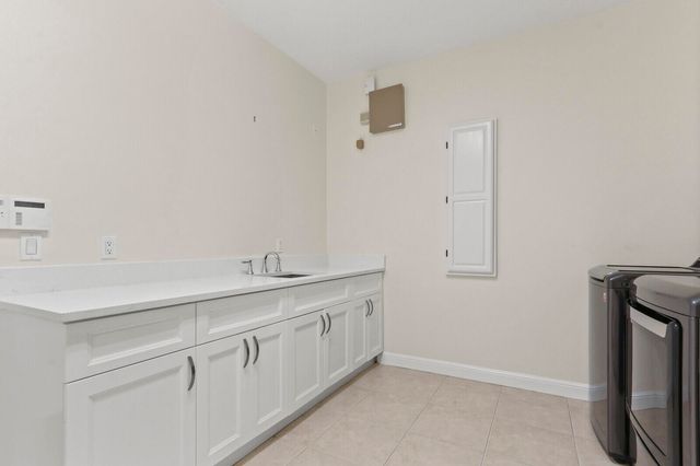 8280 Woodsmuir Drive, Palm Beach Gardens, FL 33412