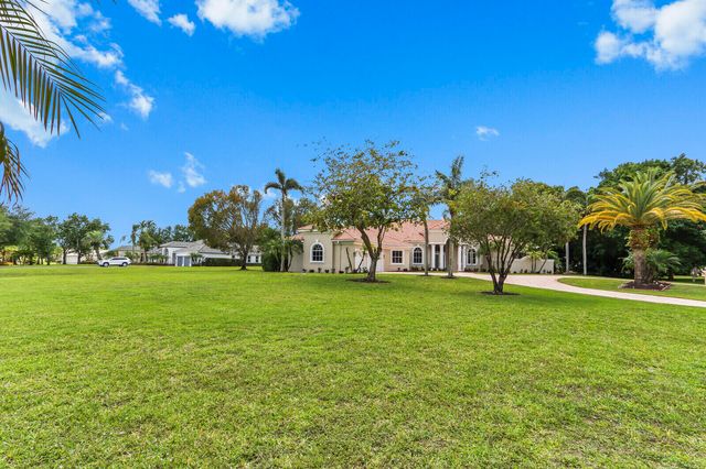 8280 Woodsmuir Drive, Palm Beach Gardens, FL 33412
