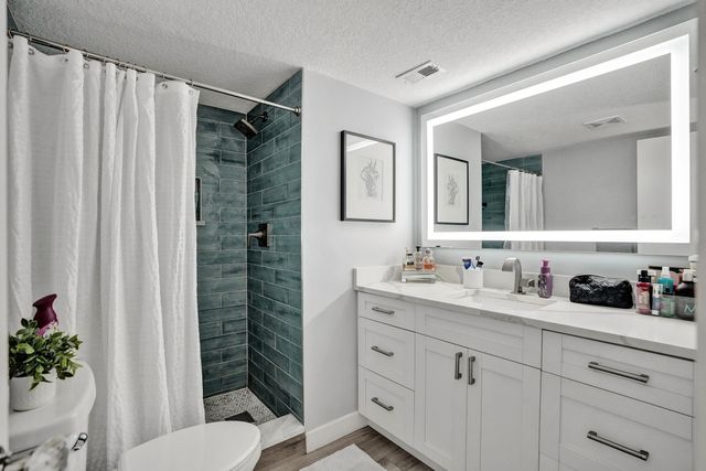 2400 Deer Creek Country Club Boulevard, Deerfield Beach, FL 33442