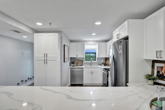 2400 Deer Creek Country Club Boulevard, Deerfield Beach, FL 33442