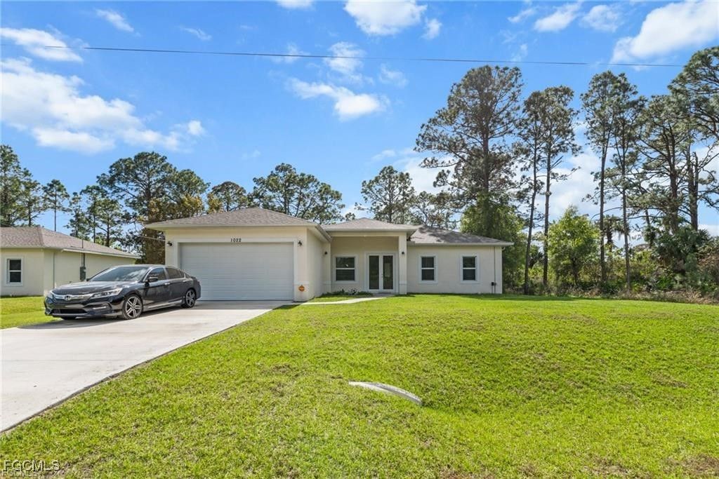 1022 Bagget ST E, Lehigh Acres, FL 33974