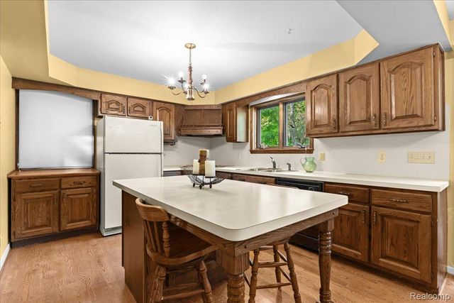 60023 Trailwood Street, Washington Township, MI 48094