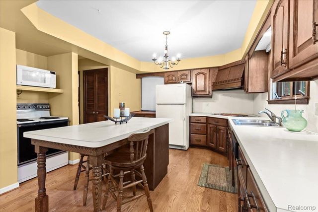 60023 Trailwood Street, Washington Township, MI 48094