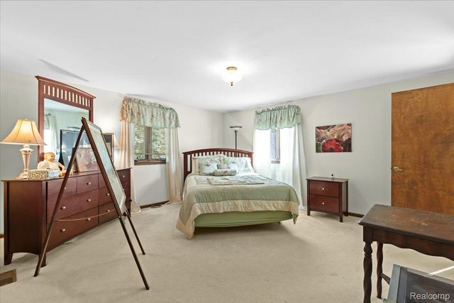 60023 Trailwood Street, Washington Township, MI 48094