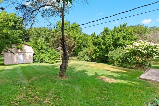 60023 Trailwood Street, Washington Township, MI 48094