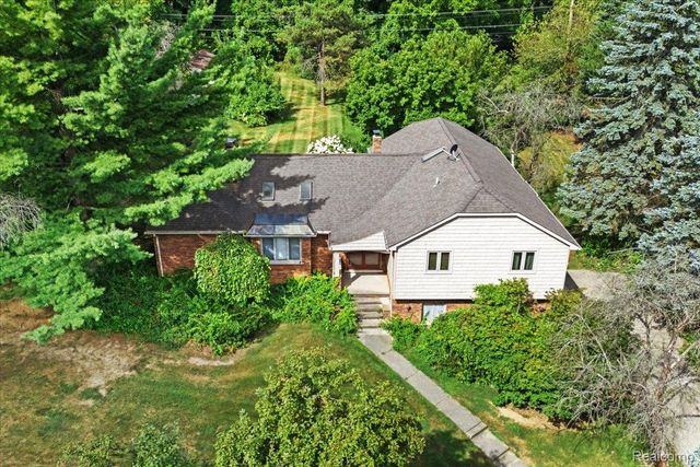 60023 Trailwood Street, Washington Township, MI 48094