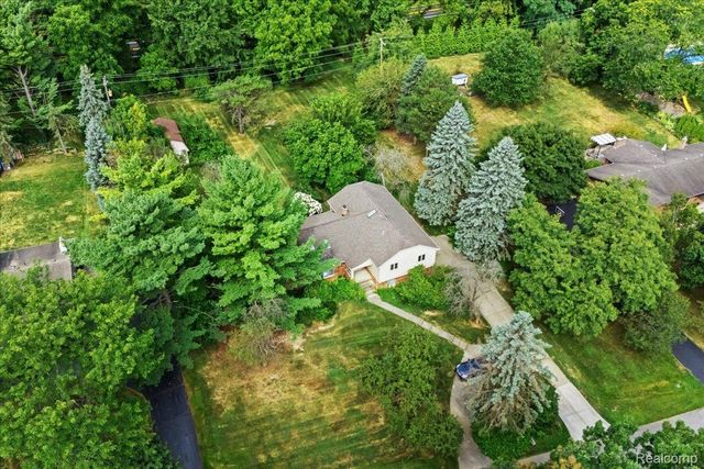 60023 Trailwood Street, Washington Township, MI 48094