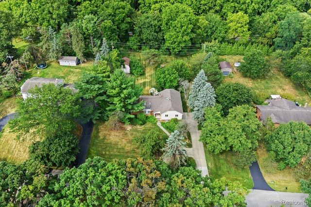 60023 Trailwood Street, Washington Township, MI 48094