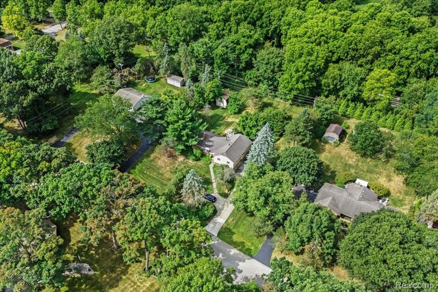 60023 Trailwood Street, Washington Township, MI 48094