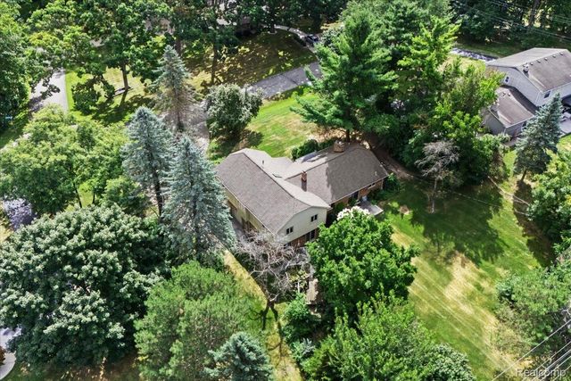 60023 Trailwood Street, Washington Township, MI 48094