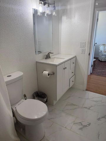 10375 PARADISE BOULEVARD 56, Treasure Island, FL 33706