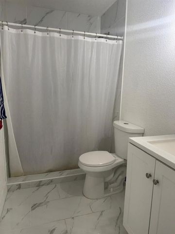 10375 PARADISE BOULEVARD 56, Treasure Island, FL 33706