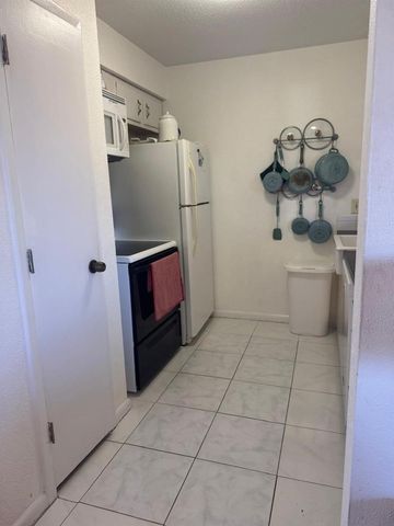 10375 PARADISE BOULEVARD 56, Treasure Island, FL 33706