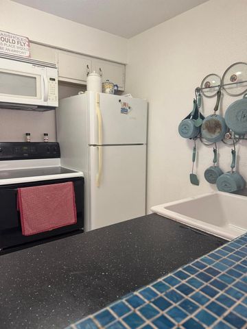 10375 PARADISE BOULEVARD 56, Treasure Island, FL 33706