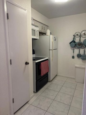 10375 PARADISE BOULEVARD 56, Treasure Island, FL 33706