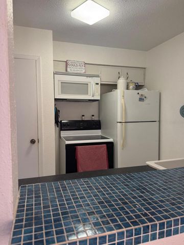 10375 PARADISE BOULEVARD 56, Treasure Island, FL 33706