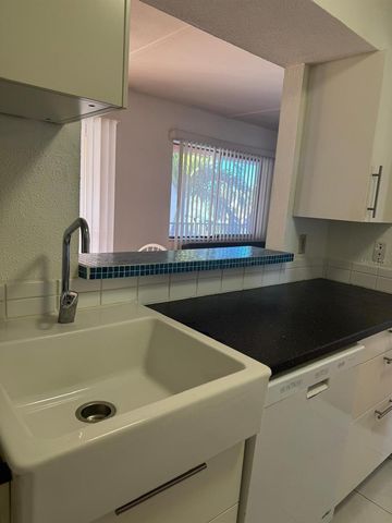 10375 PARADISE BOULEVARD 56, Treasure Island, FL 33706