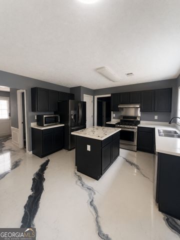 124 Heathrow Drive, Riverdale, GA 30274