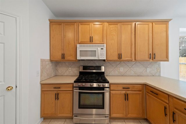 27 New Dawn Pl, The Woodlands, TX 77385