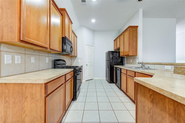 6030 Starbrook Creek Drive, Katy, TX 77494