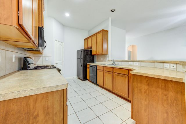6030 Starbrook Creek Drive, Katy, TX 77494