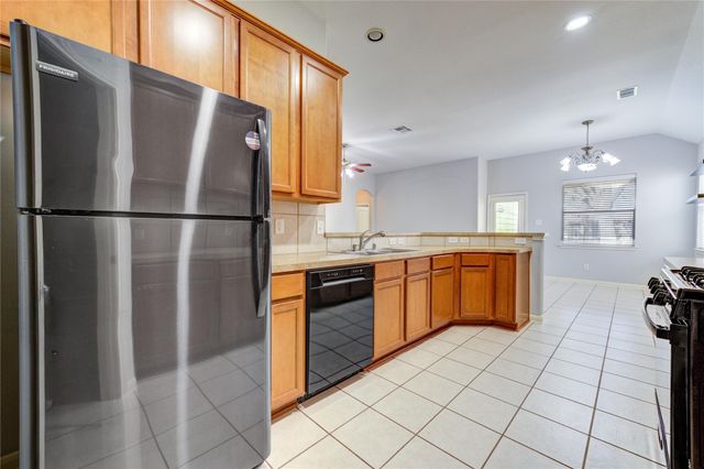 6030 Starbrook Creek Drive, Katy, TX 77494